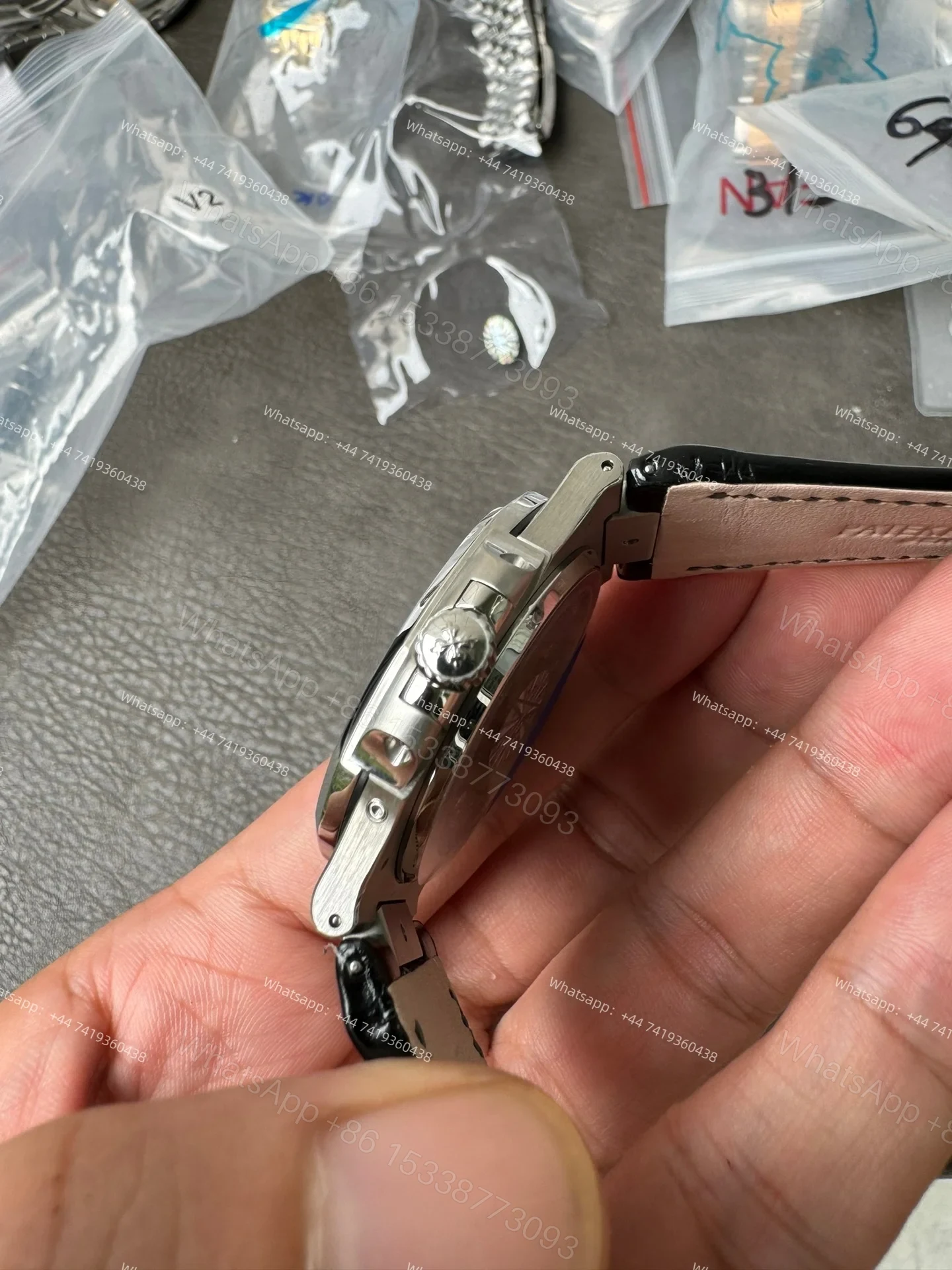 View 8 of Patek Philippe Super Clone Nautilus 5712G-001 Grey Dial Moon Phase 40MM