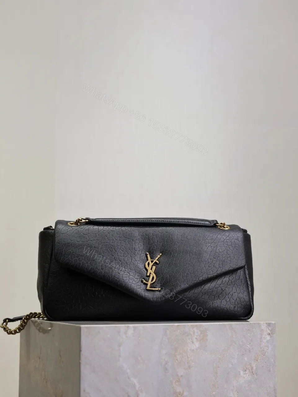 Textured Leather Crossbody Clutch with Gold Logo hardware — view 1
