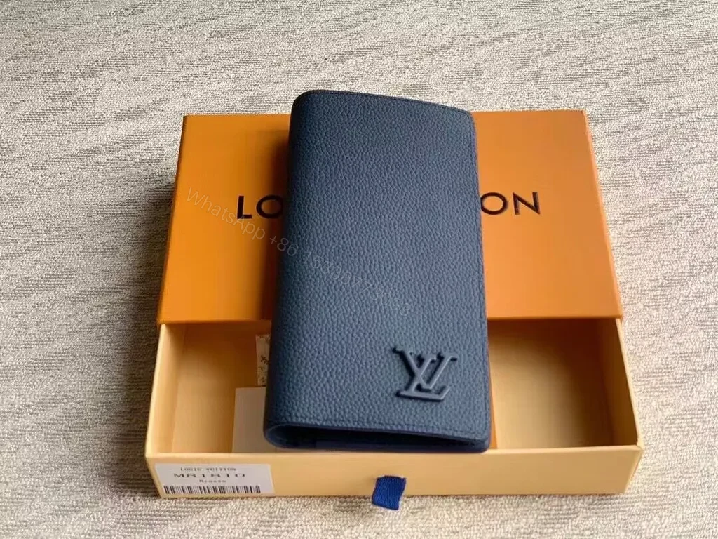 View 3 of Navy Pebbled Calfskin Long Wallet â€“ Subtle LV Luxe