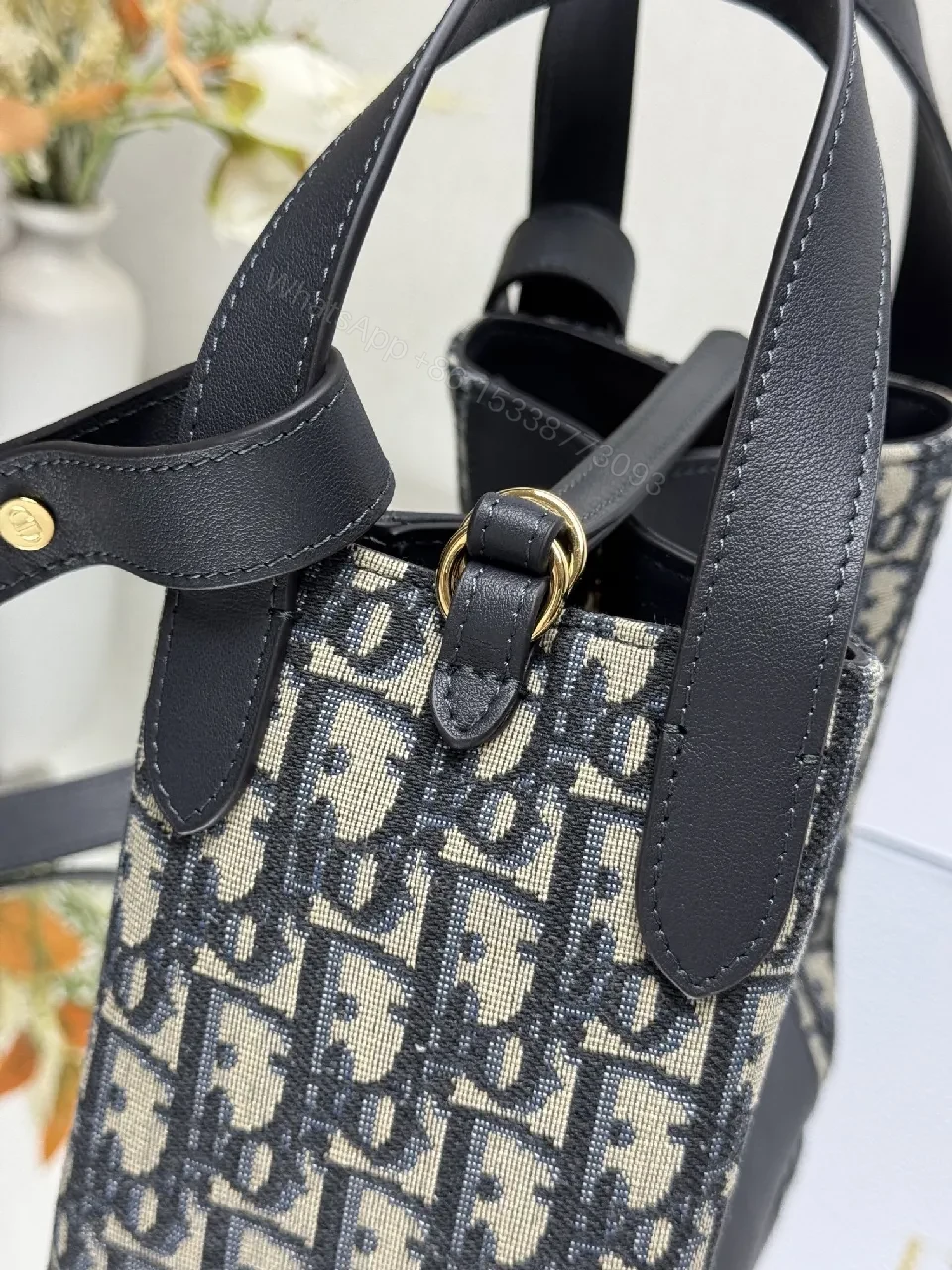 View 9 of Structured Black Leather Monogram Mini Bag with Gold Hardware