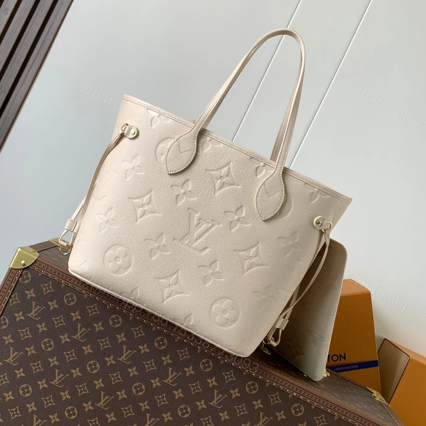 LV NEVERFULL 32 LIGHT BEIGE MONOGRAM EMPREINTE LEATHER — view 1