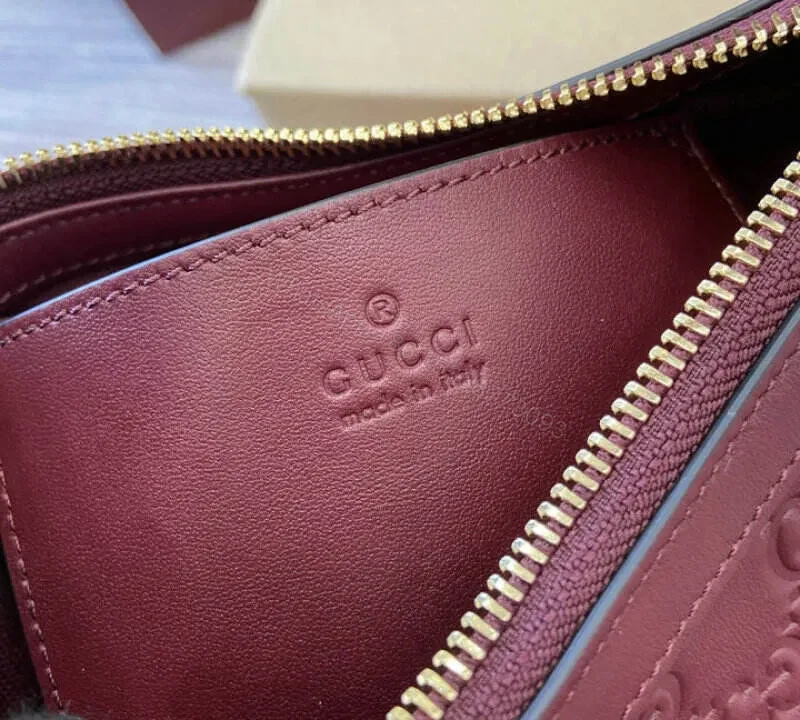 View 10 of Gucci GG Emblem Small Shoulder Bag – Rosso Ancora Red Leather