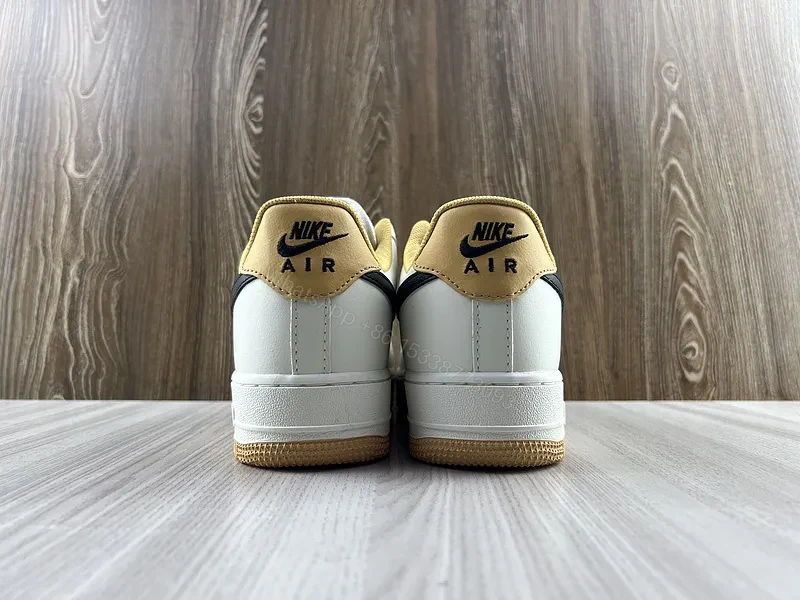 View 2 of White Leather Low-Tops with Navy Swoosh, Minimal Luxury Sneakers