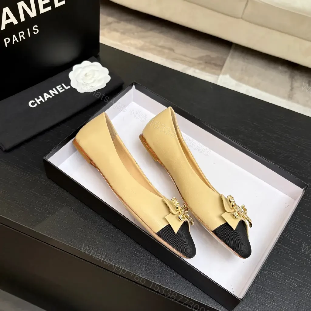 View 8 of Beige Leather Flats with Black-Toe Cap & Crystal Bow
