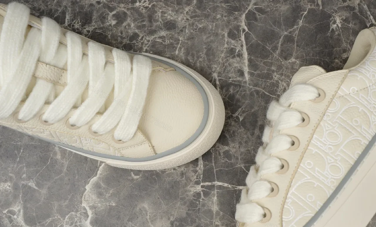View 8 of White Leather Minimalist Low-Top Sneakers with Luxe Trim