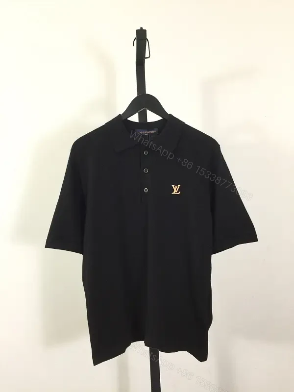 Solid Black Polo Shirt with Gold LV Logo, Short Sleeves, Classic Collar — view 1