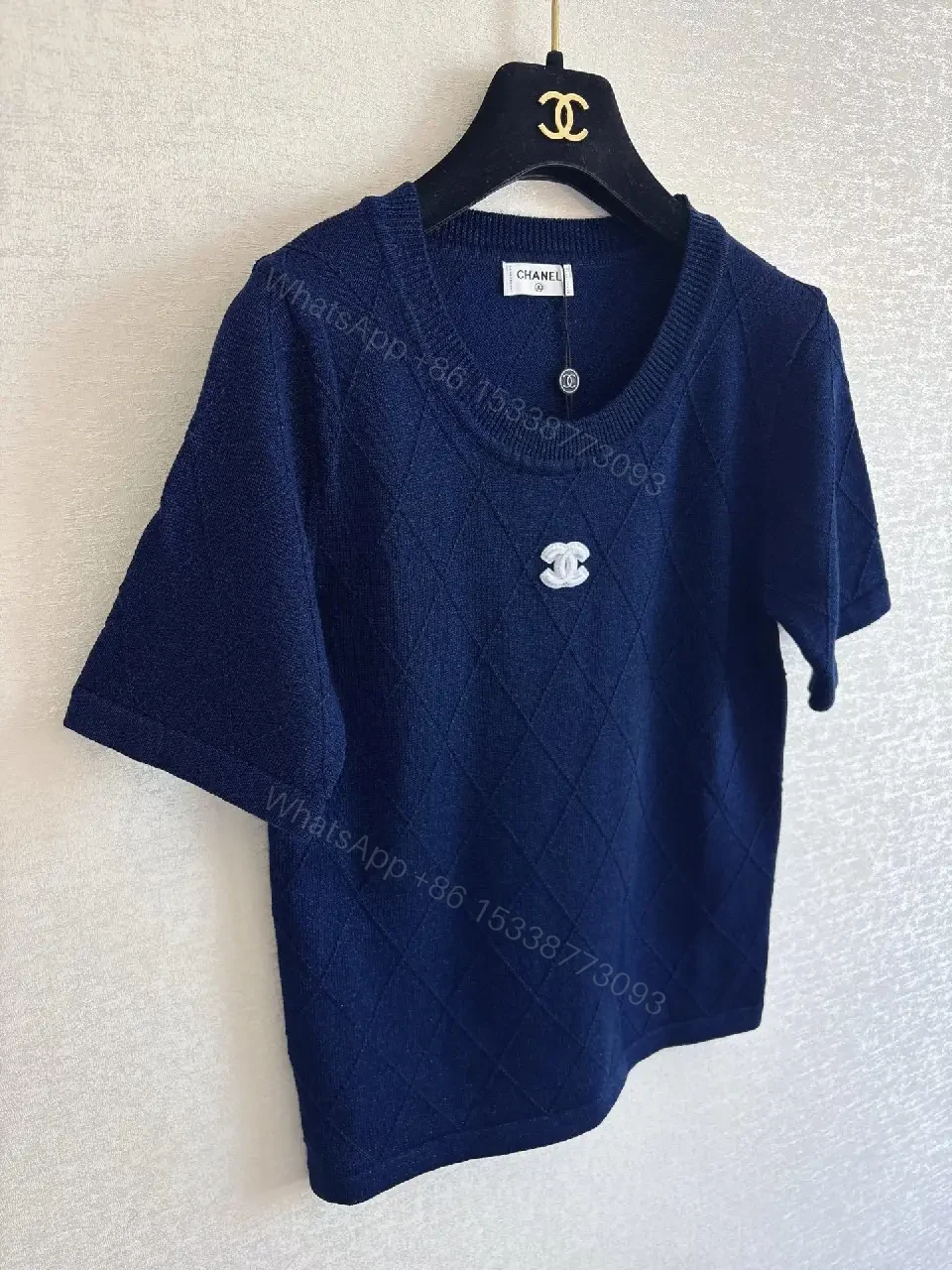 View 2 of Navy Knit Tee with Quilted Texture and Subtle Crest