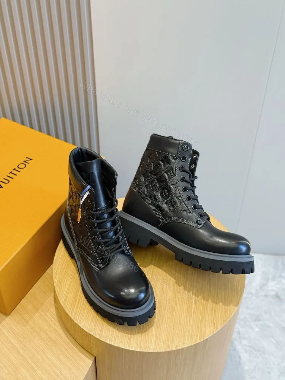 View 4 of Bold Textured Leather Combat Boots with Luxe Detailing