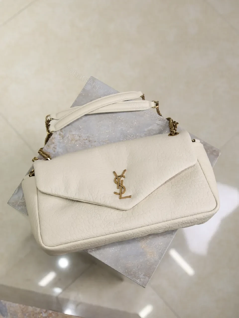 View 3 of Ivory Pebbled Leather Chic Handbag with Gold Hardware
