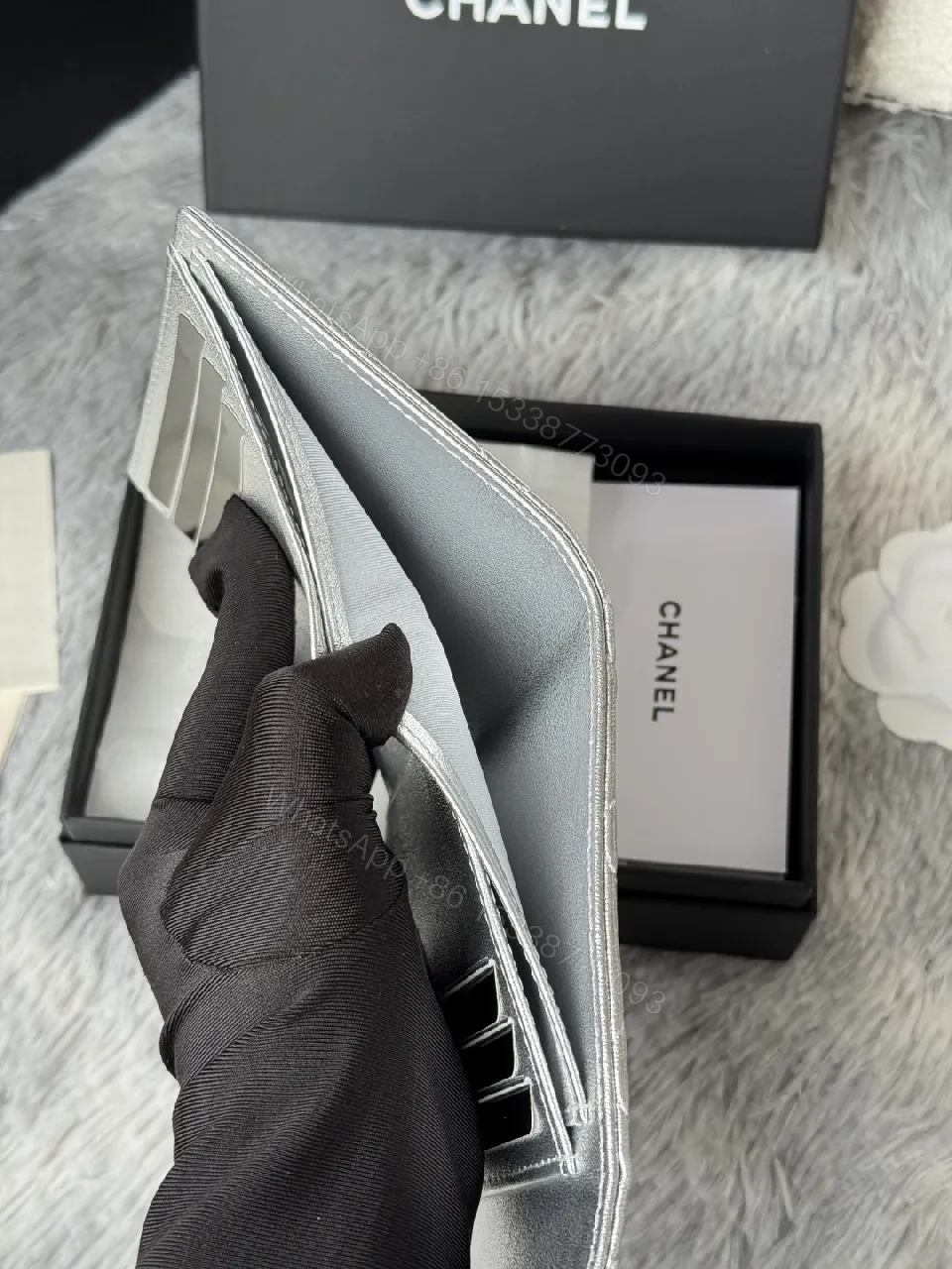 View 6 of Compact Silver Quilted Wallet with Signature Hardware
