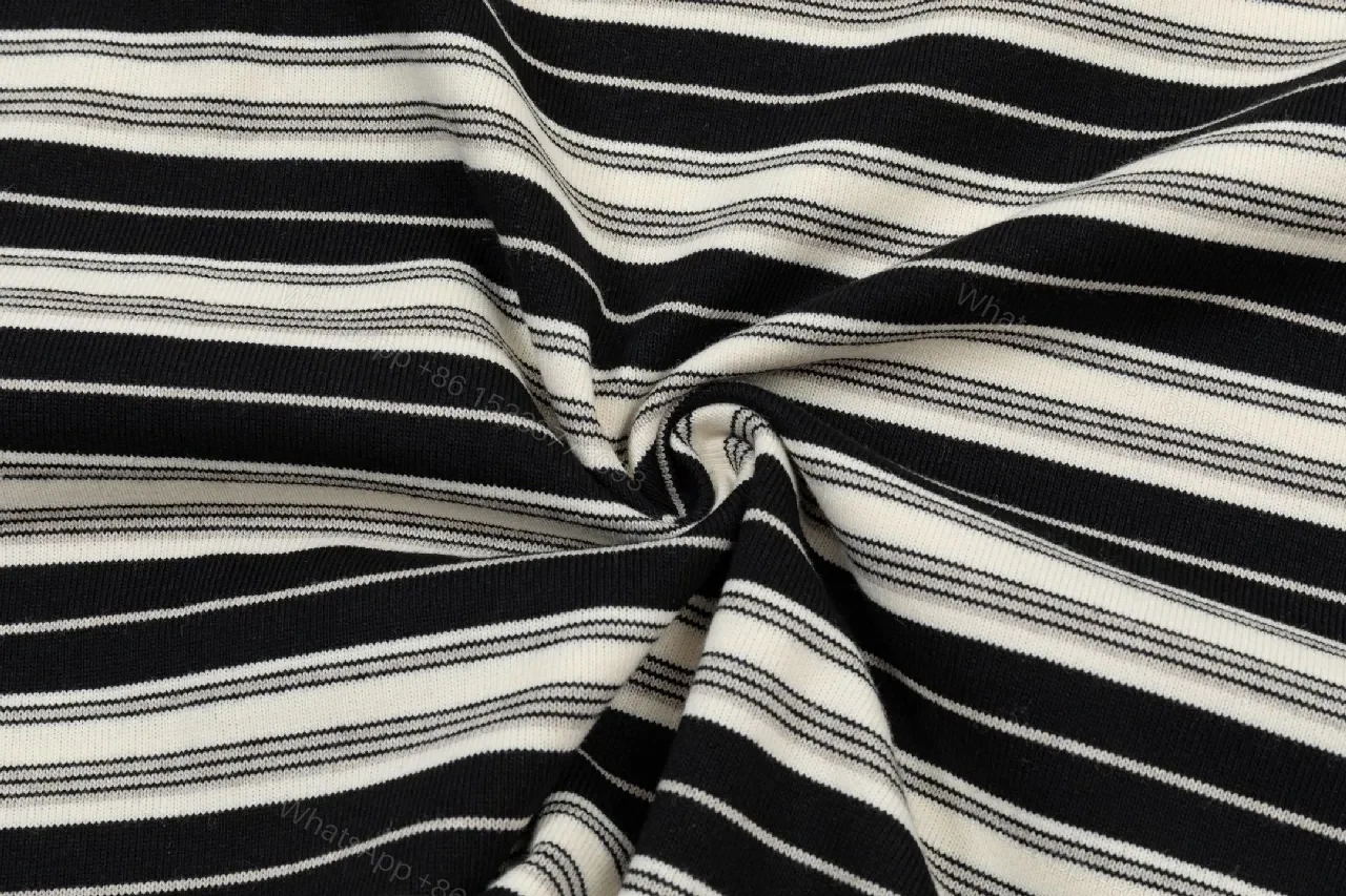 View 2 of Striped Knit Crewneck: Subtle Logo, Versatile Luxury Knit
