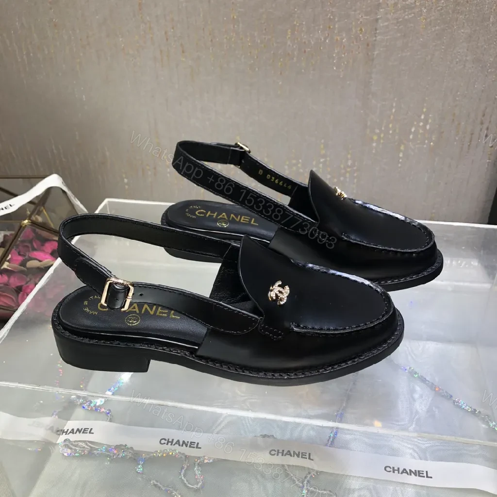 View 7 of Black Leather Mules with Gold Logo Hardware, Minimal Slider Mule