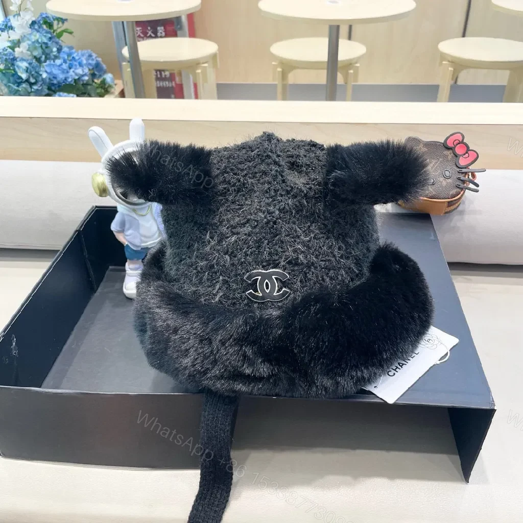 View 9 of Lux Fleece Trim Knit Hat with Signature Emblem