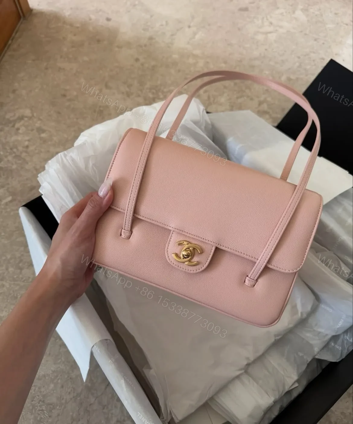 Chanel Caviar Preppy Coco Small Flap bag in light pink color — view 1