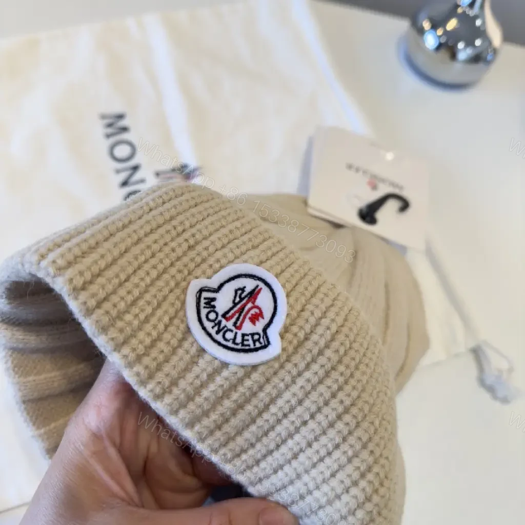 View 3 of Beige Ribbed Knit Beanie – Luxury, Signature Patch, Everyday Style