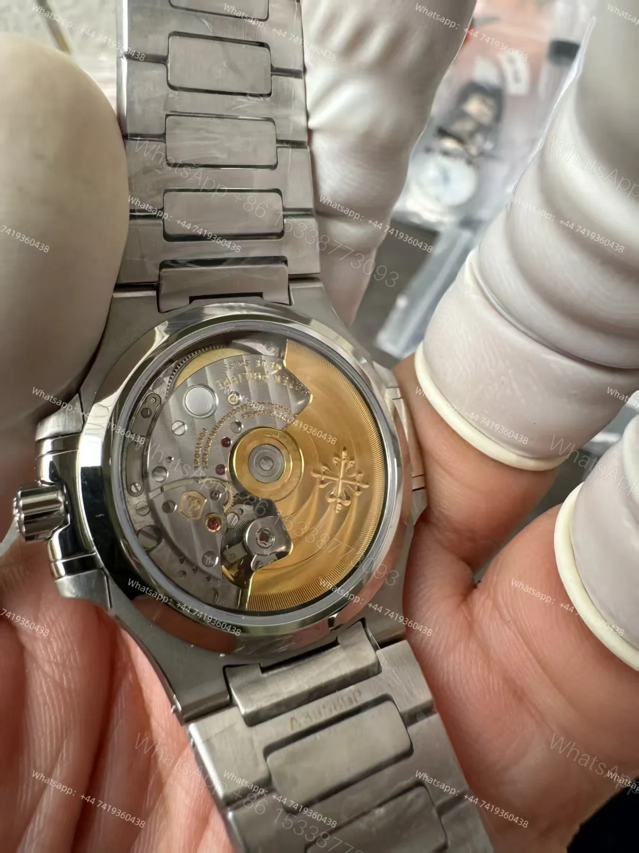 View 14 of Patek Philippe Super Clone Nautilus 7118/1200A-010 White Dial Diamond Bezel 35.2mm