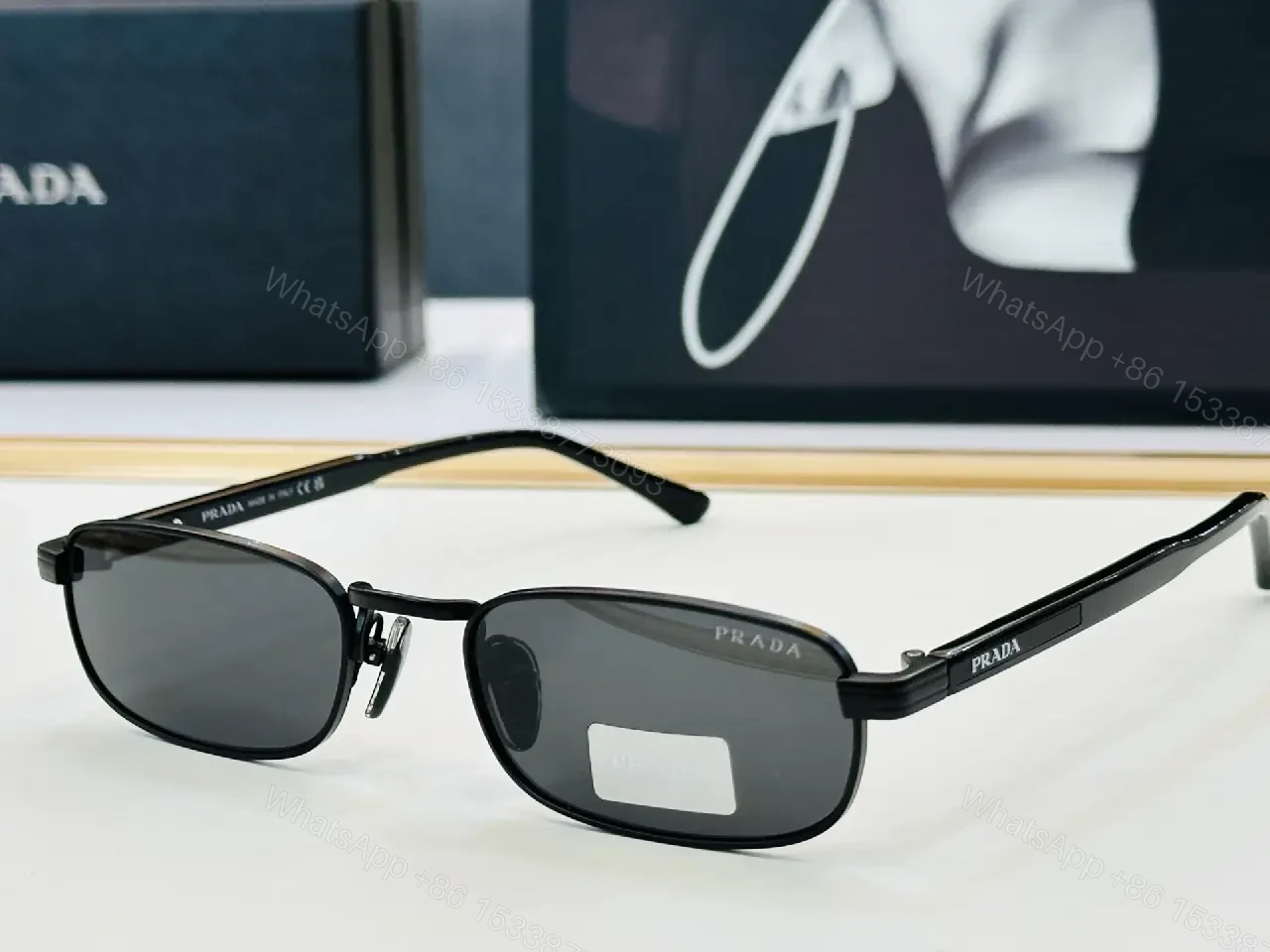 View 8 of Black Plastic/Acrylic Rectangular Semi-Rimless Narrow Metal Bridge Sunglasses