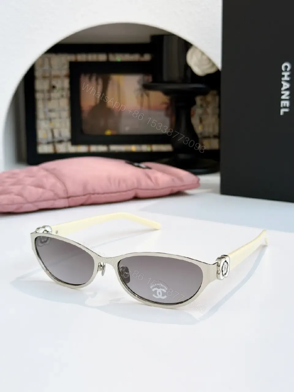 View 8 of Gold Cat-Eye Sunglasses with Chanel Logo Accents