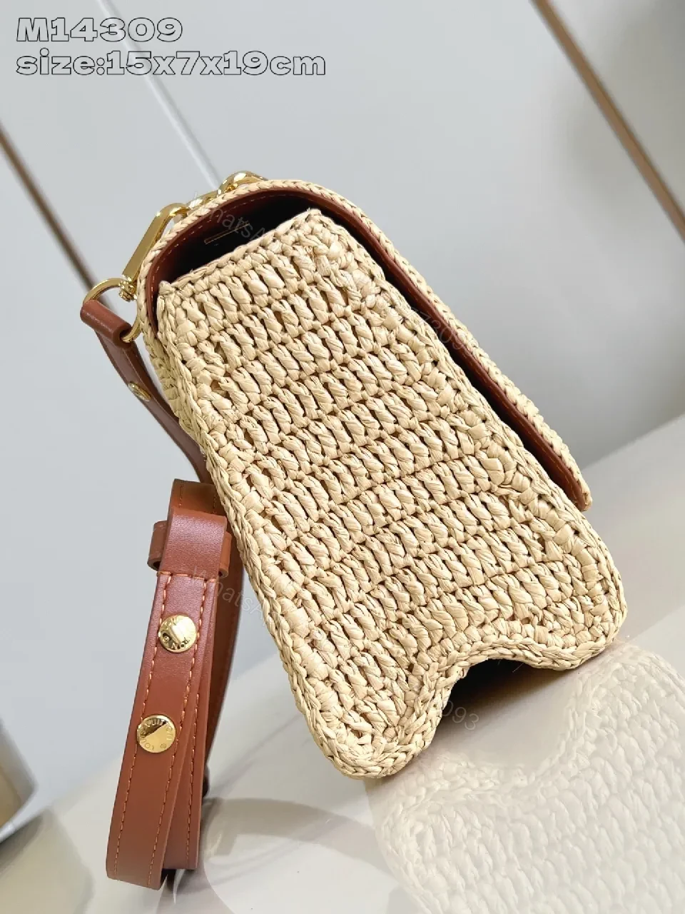 View 5 of Elegant Woven Straw Shoulder Bag with Gold Hardware