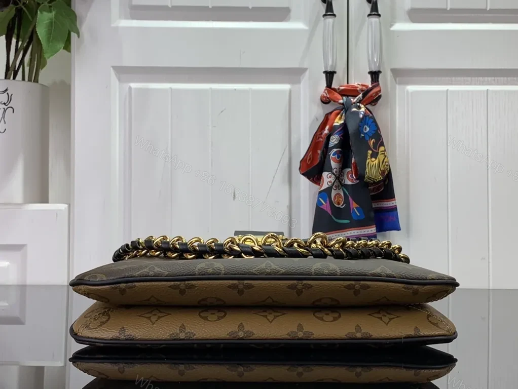 View 8 of Iconic Monogram Canvas Bag: Modern Shine, Gold Hardware, Everyday Luxury