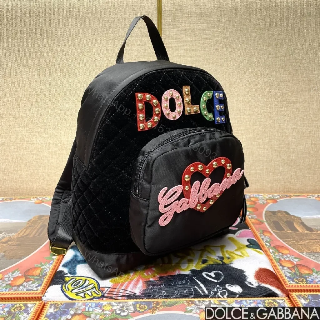 View 3 of Black Quilted Backpack with Colorful Logo Embellishments, All-Day Comfort