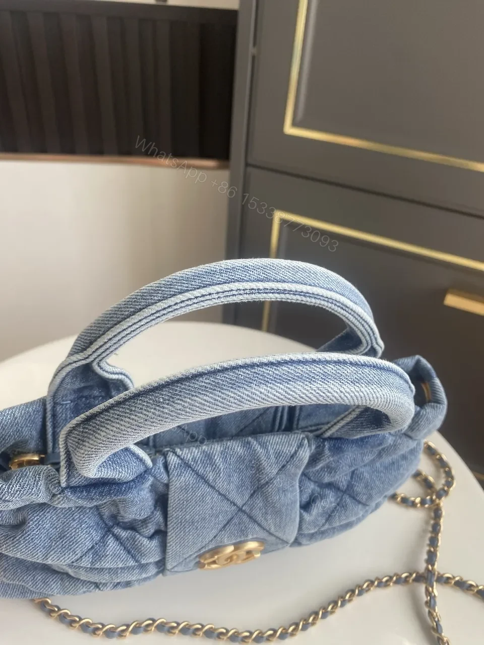 View 7 of Denim Quilted Mini Bag with Gold Hardware - Structured Chic