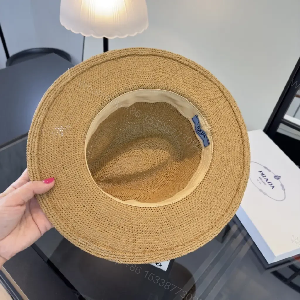 View 3 of Light Tan Straw Wide-Brimmed Floppy Hat with Black Ribbon Band