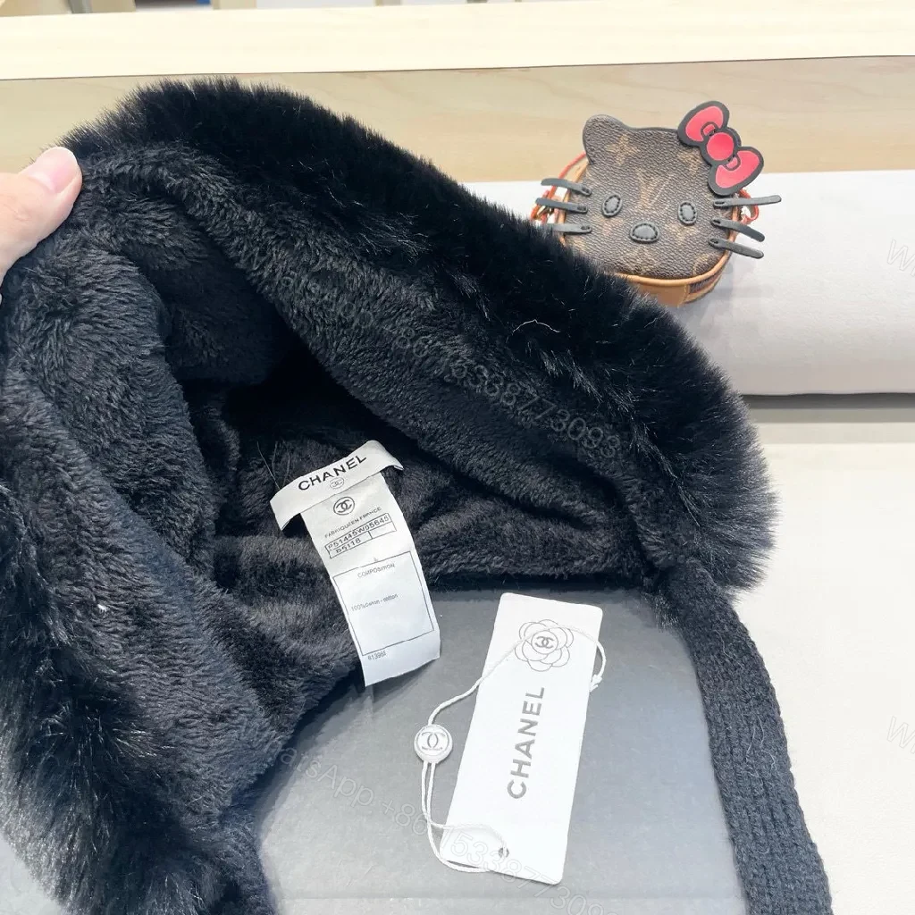 View 4 of Lux Fleece Trim Knit Hat with Signature Emblem