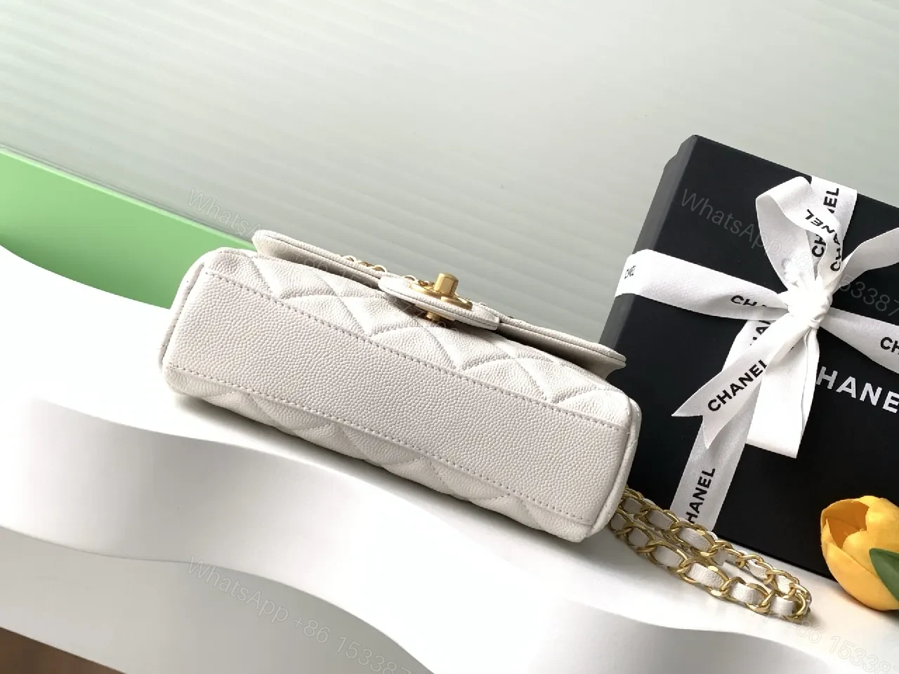 View 3 of Quilted Mini Flap Bag with Gold Chain - Classic Chic Crossbody