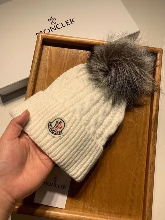 View 9 of Cozy Cable Knit Beanie with Fur Pom â€” Moncler Luxury Warmth