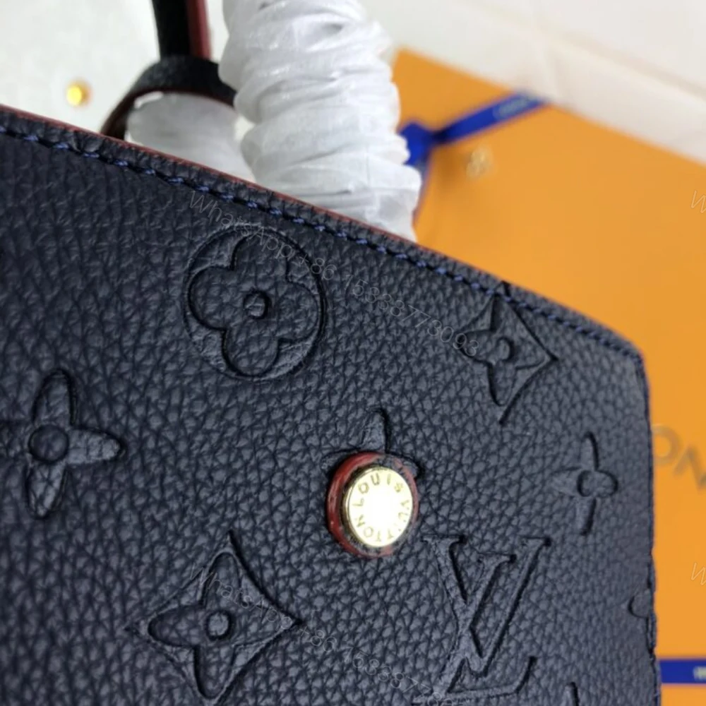 View 5 of Louis Vuitton Montaigne MM Monogram Empreinte Navy Blue 33Cm M42746
