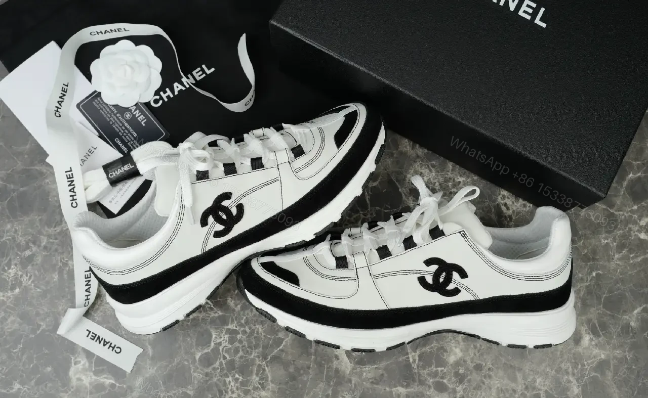 View 5 of White Leather Chunky Sneaker with Chanel Logo Details