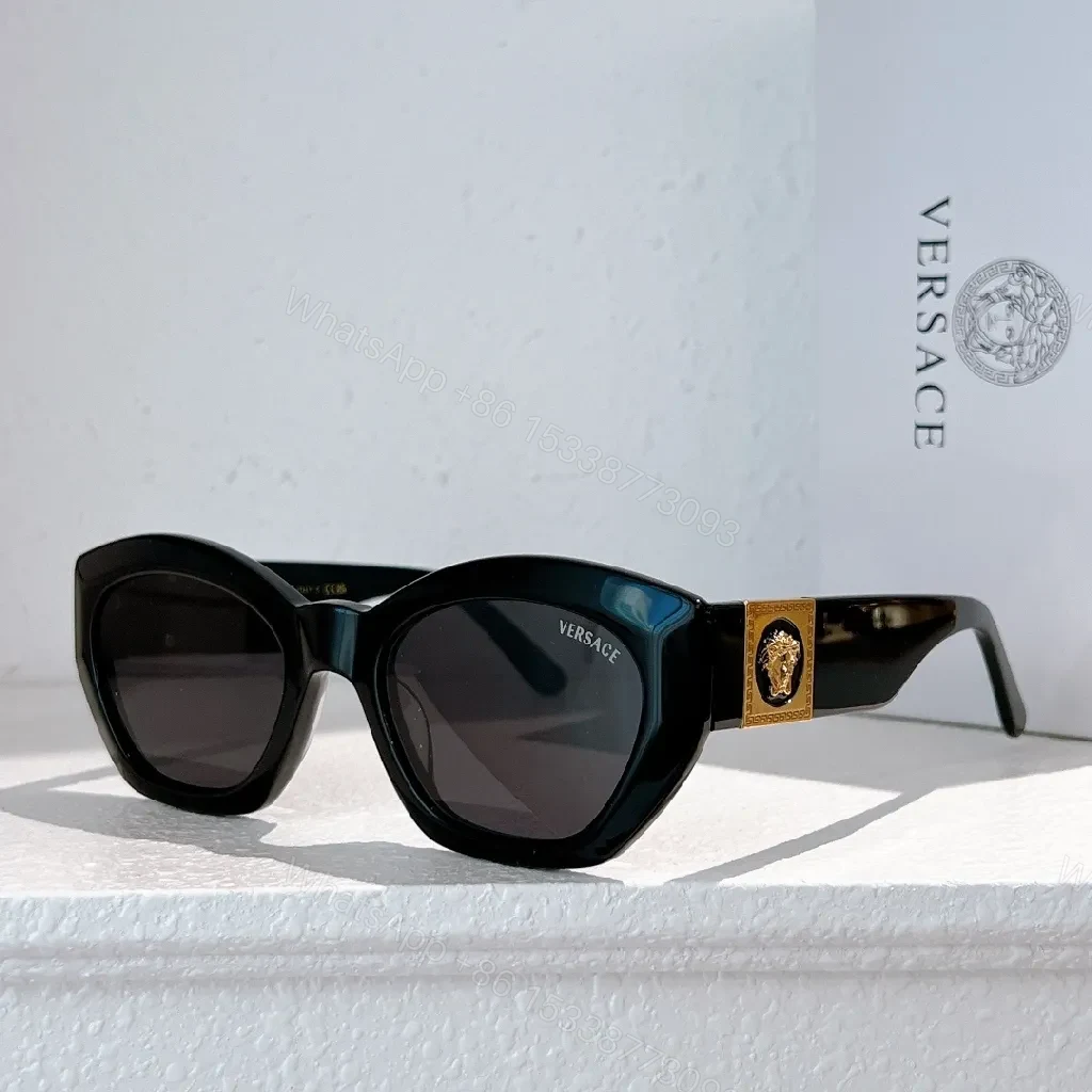 View 2 of Bold Tortoise Cat-Eye Sunglasses with Gold Medallion Accents