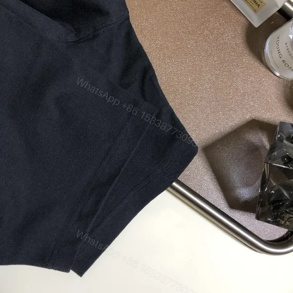 View 6 of Solid Black Short-Sleeve Tunic with Plaid Collar