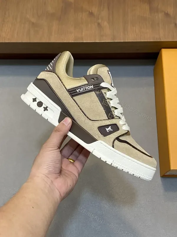 Beige Canvas Louis Vuitton-Style Sneaker with Iconic Accents — view 1