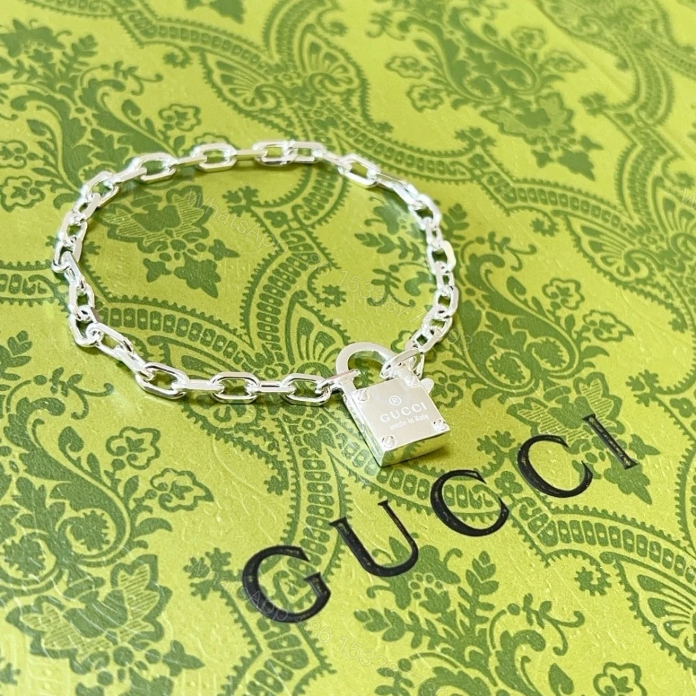View 3 of GUCCI TRADEMARK SILVER CHAIN ​​BRACELET WITH PADLOCK
