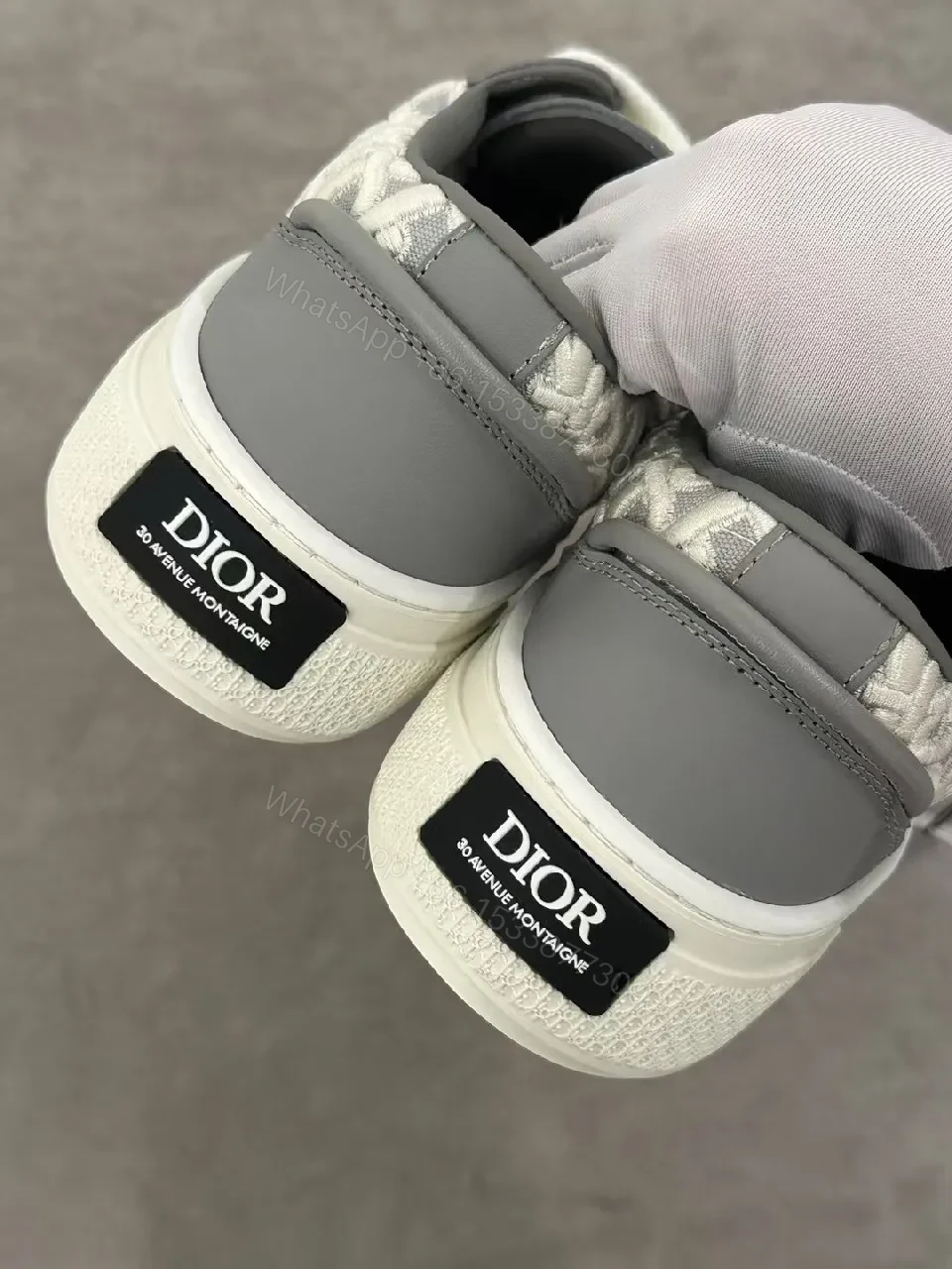 View 2 of Gray Leather Sneaker with Monogram Pattern, Luxurious Texture, Casual High-Tops