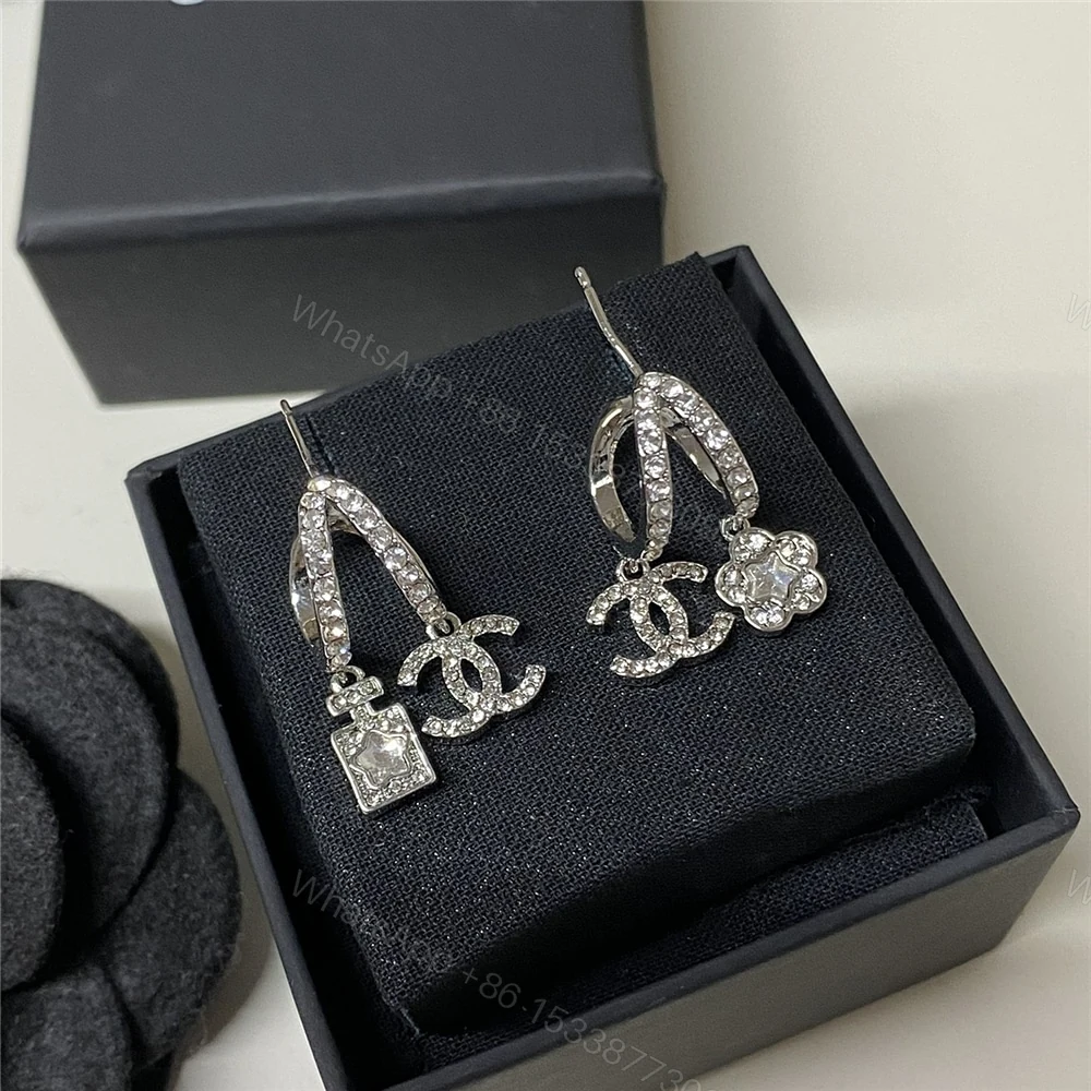 View 3 of CHANEL PENDANT EARRINGS METAL AND DIAMANTÉS IN SILVER ABF199 B19948 NAFVP