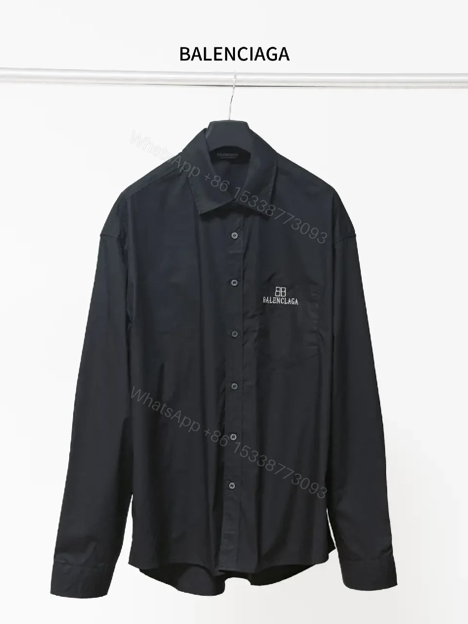 View 10 of Structured Minimalist Button-Front Shirt with Subtle Crest, Black
