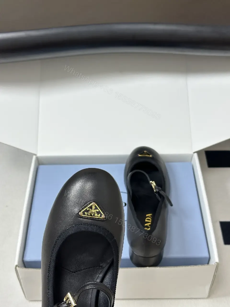 View 9 of Black Leather Mary Jane Heels with Logo Charm, Prada Style