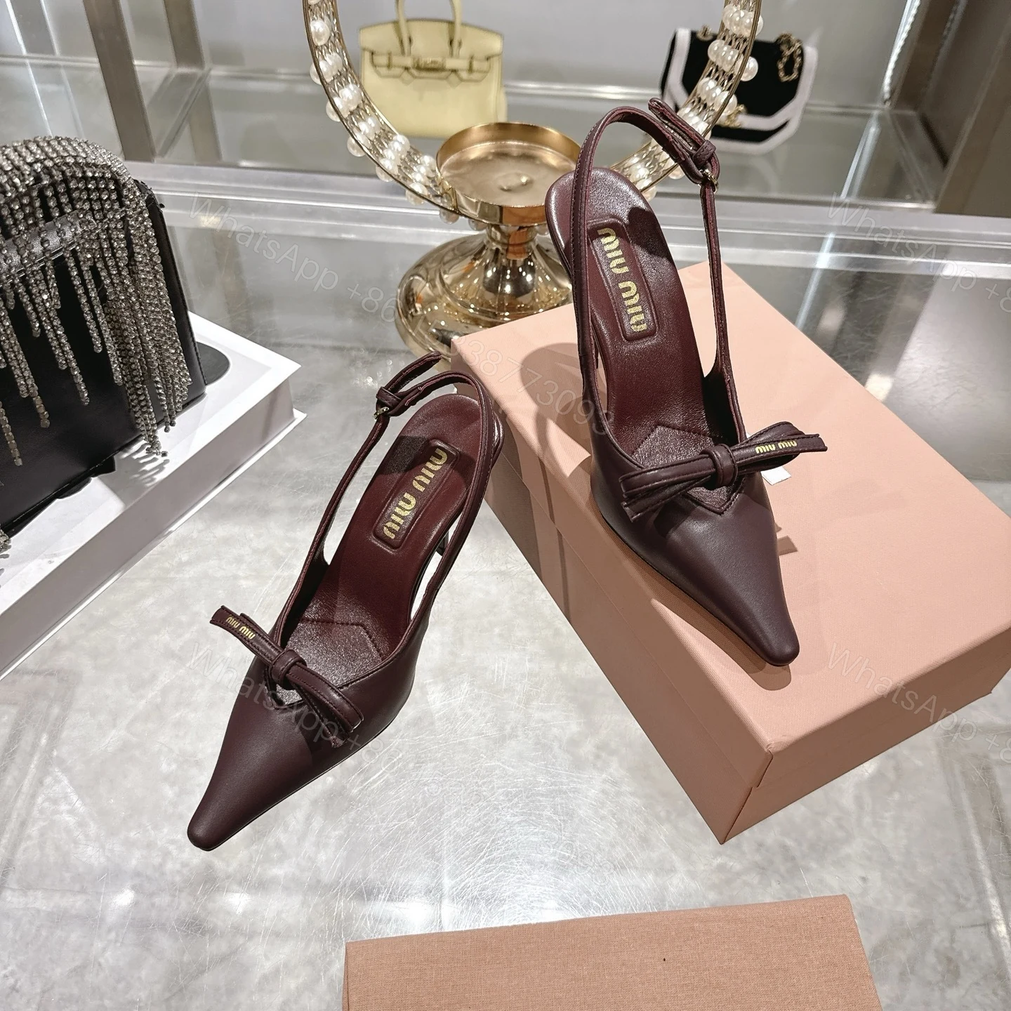 View 5 of Miu Miu Slingback Pumps With Bow Red