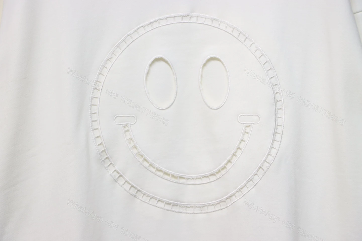 View 2 of Loewe Hollowed-out Smiling Round-neck Hoodie White