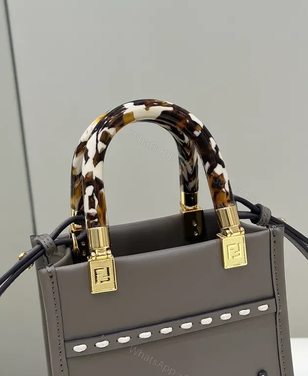 View 5 of Structured Mini Bag: Sculpted Logo, Tortho Handle, Gold Accents