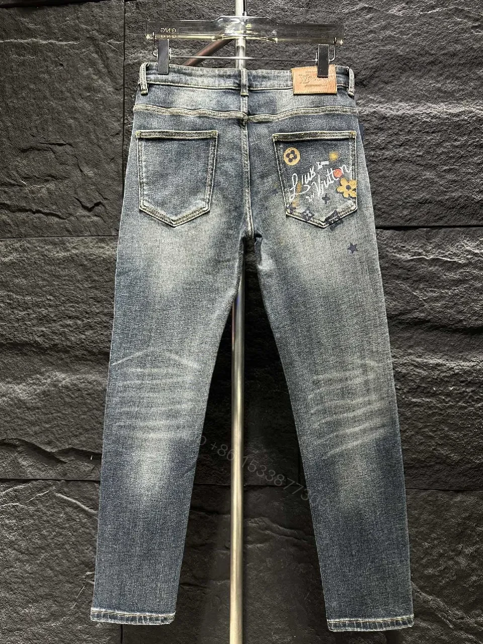 View 3 of Distressed Indigo Jeans with LV-Inspired Embellishments - Denim Luxe style