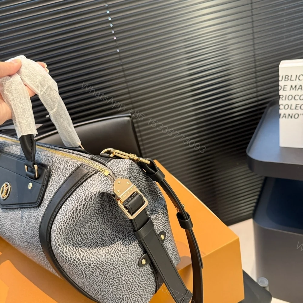 View 4 of LOUIS VUITTON LV BIKER MM DARK DENIM 37CM M14702