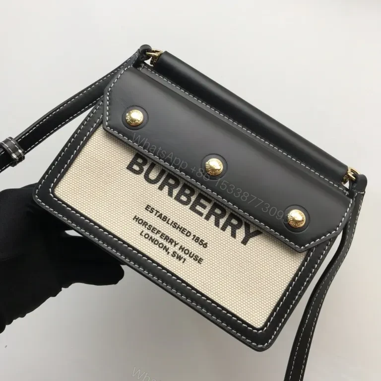 View 4 of Beige Canvas & Black Leather Crossbody: Bold Brand Duo
