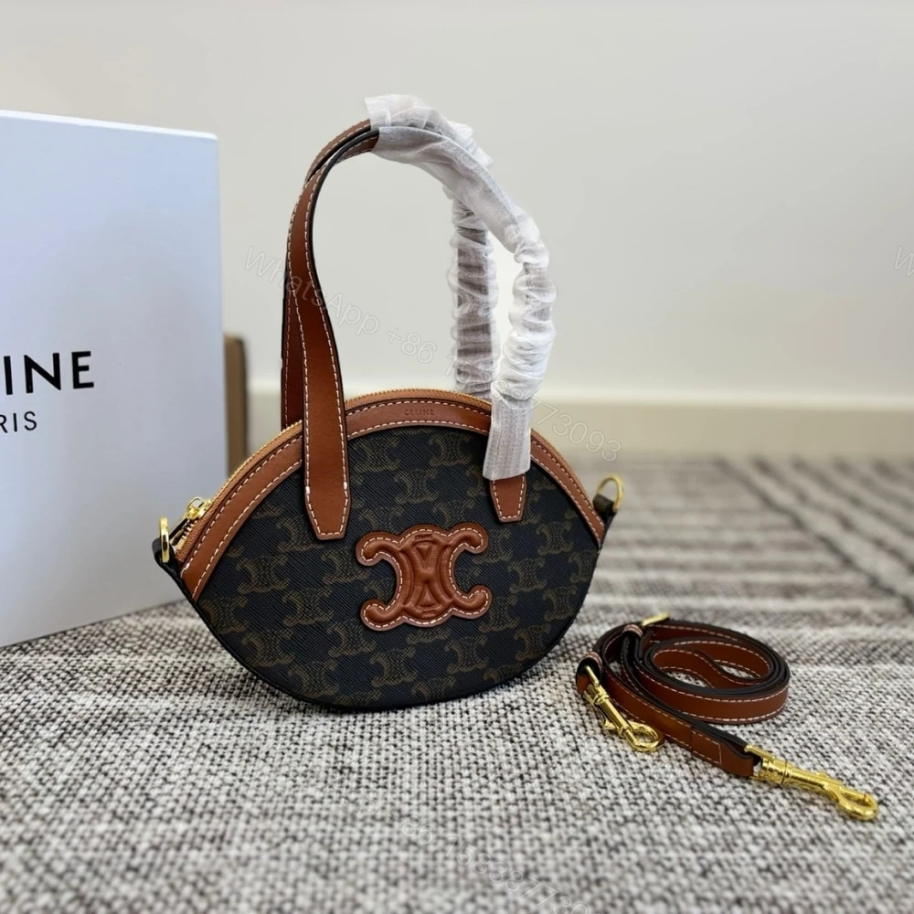 View 2 of CELINE OAL BAG IN TRIOMPHE CANVAS TAN 24CM 122262BZJ 04LU