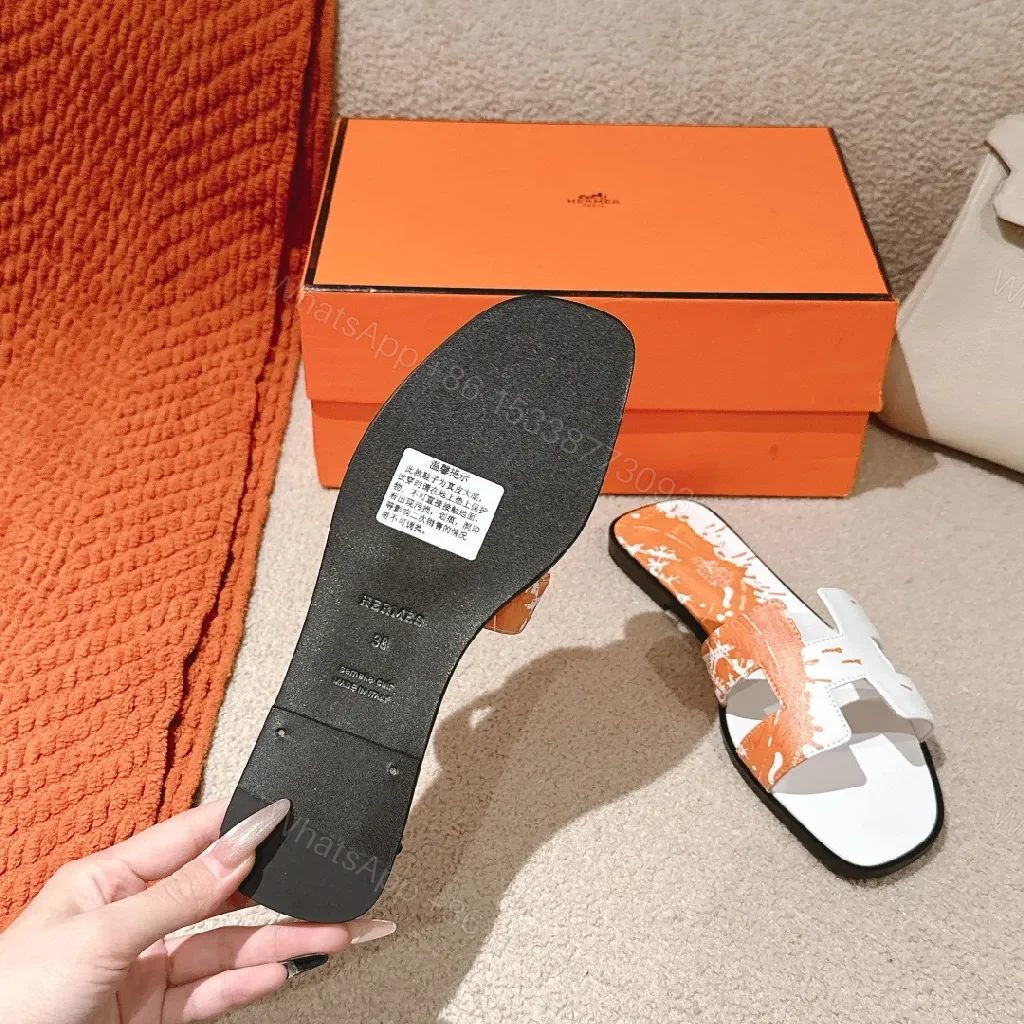 View 3 of Bold Orange-Accent White Leather Slides, Comfort-Chic Street Style