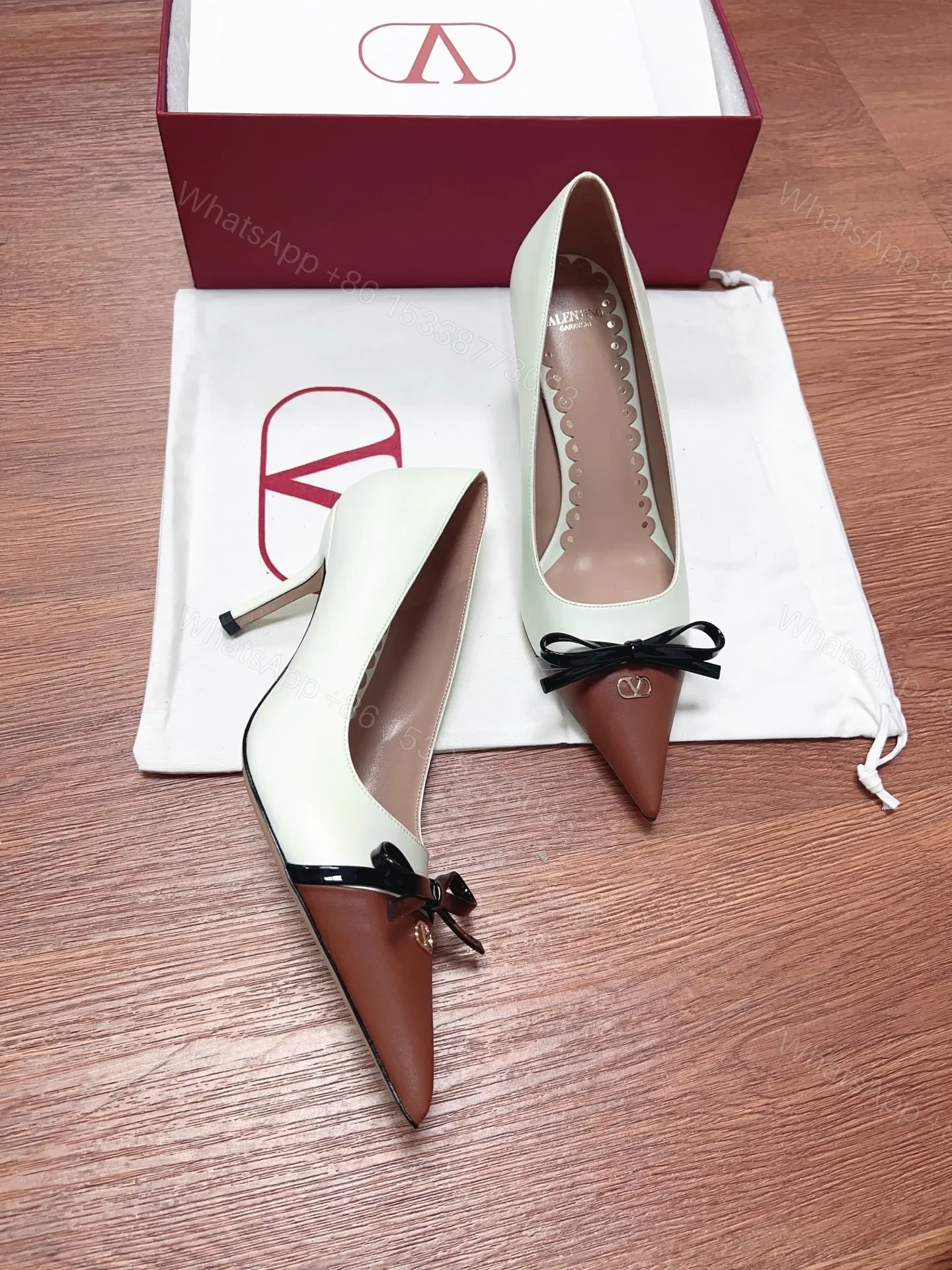 View 4 of Valentino Women White Leather Brown Bow Detail Pumps