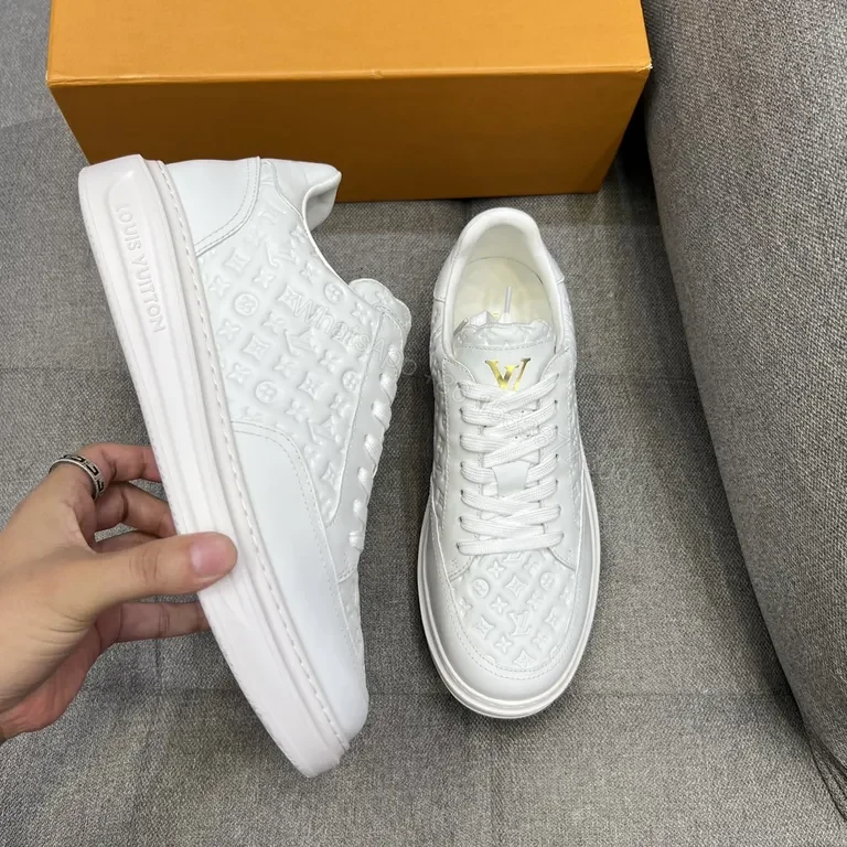 View 7 of White Leather Sneakers with Gold LV Accent, Luxe Everyday